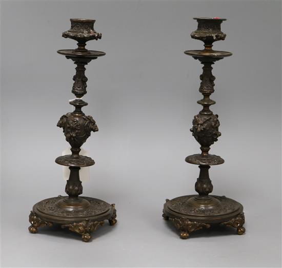 A pair of bronze candlesticks height 29cm